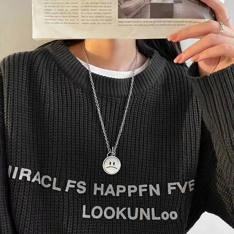 Smilie Face Flip Pendant worn by a model